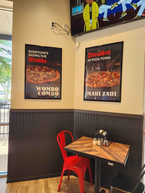 Wambo Combo & Maui Zaui Pizzas, Wambo Combo is basically the supreme with artichoke hearts. Maui Zaui is Hawaiian pizza.