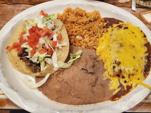 Pancho Villa Plate - 2 Cheese Enchiladas, Rice, Beans, & a Puffy Taco.