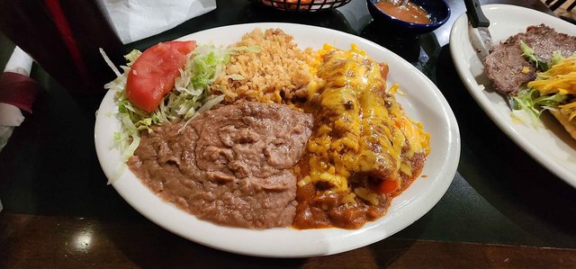 Deluxe Plate, Enchilada Rice & Beans (Puffy Taco & Steak on side)