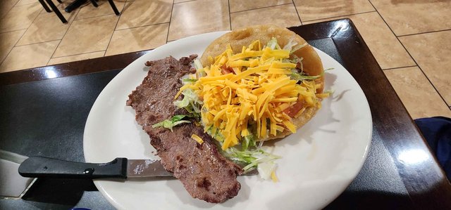 Deluxe Plate, Enchilada Rice & Beans (Puffy Taco & Steak on side)