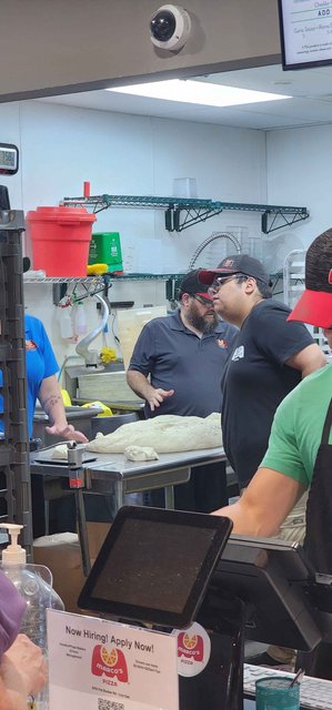 Marco's Pizza - Cutting Dough In The Kitchen