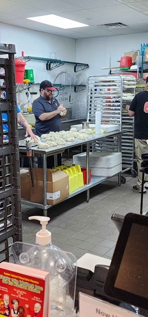 Marco's Pizza - Cutting Dough In The Kitchen