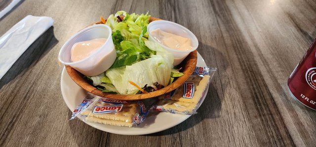 Salad included with steak.